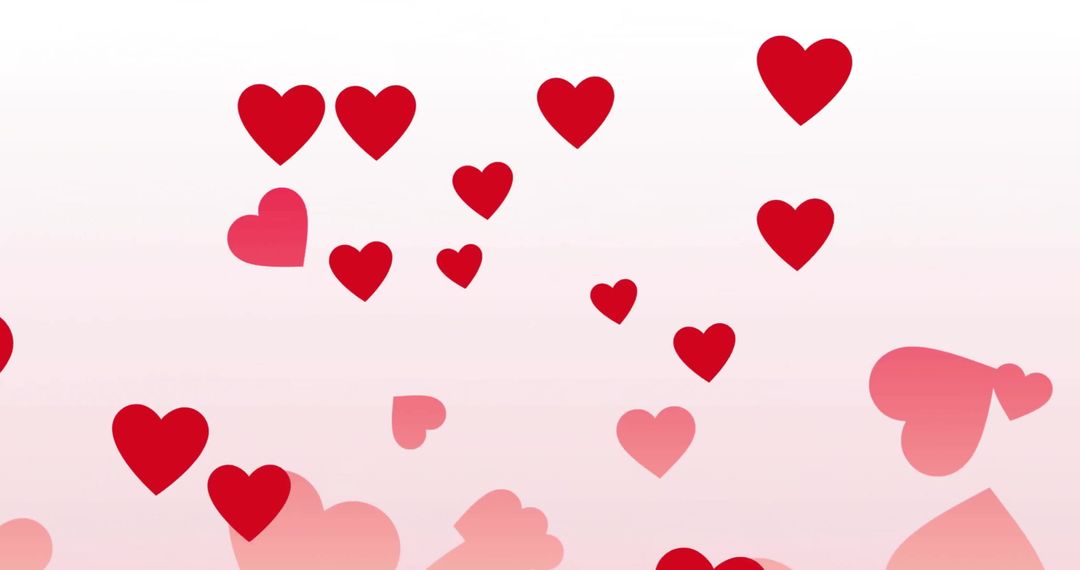 Floating Red Hearts on Soft Pink Background