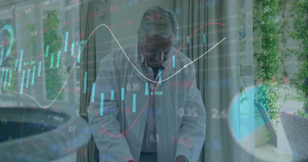 Senior Male Professional Reviewing Documents With Data Overlay