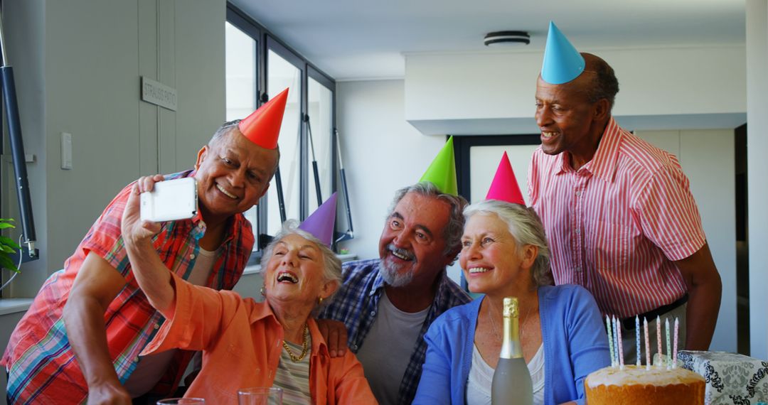 Senior Friends Enjoying Birthday Celebration with Cake - Free Images, Stock Photos and Pictures on Pikwizard.com