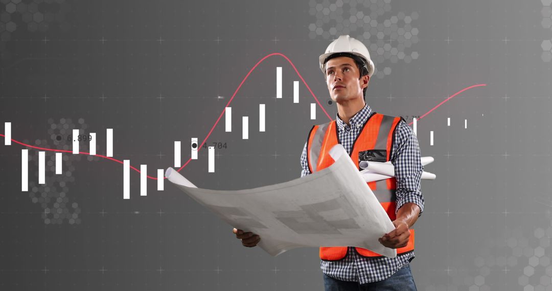 Engineer Analyzing Architectural Plans with Digital Graphs