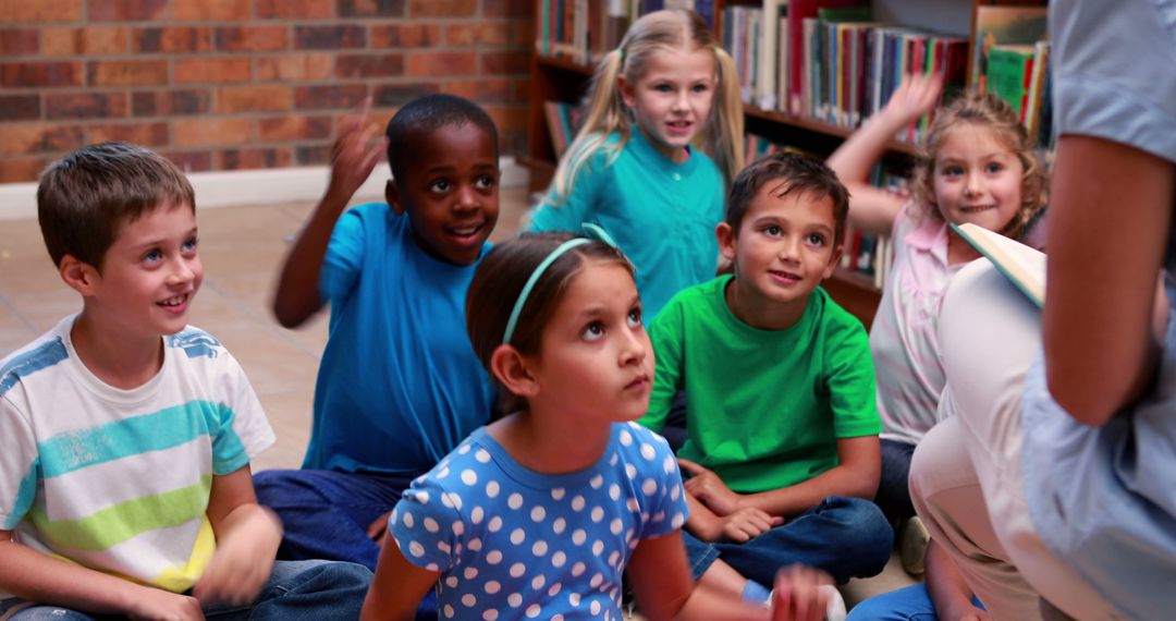 Enthusiastic Children Participating in Storytelling Session at Library - Free Images, Stock Photos and Pictures on Pikwizard.com