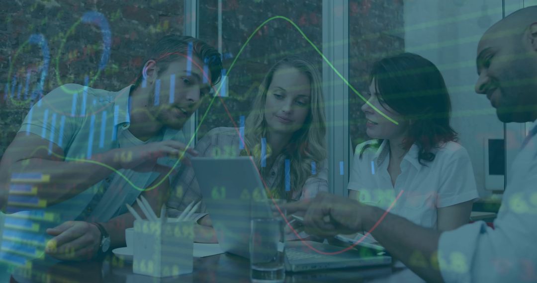 Collaborative team analyzing financial charts on laptop with data visualization overlay