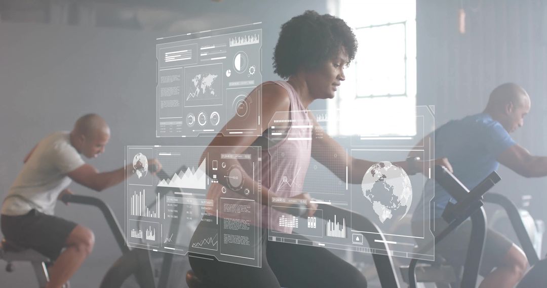 Diverse Fitness Enthusiasts Cycling with Digital Fitness Tracker