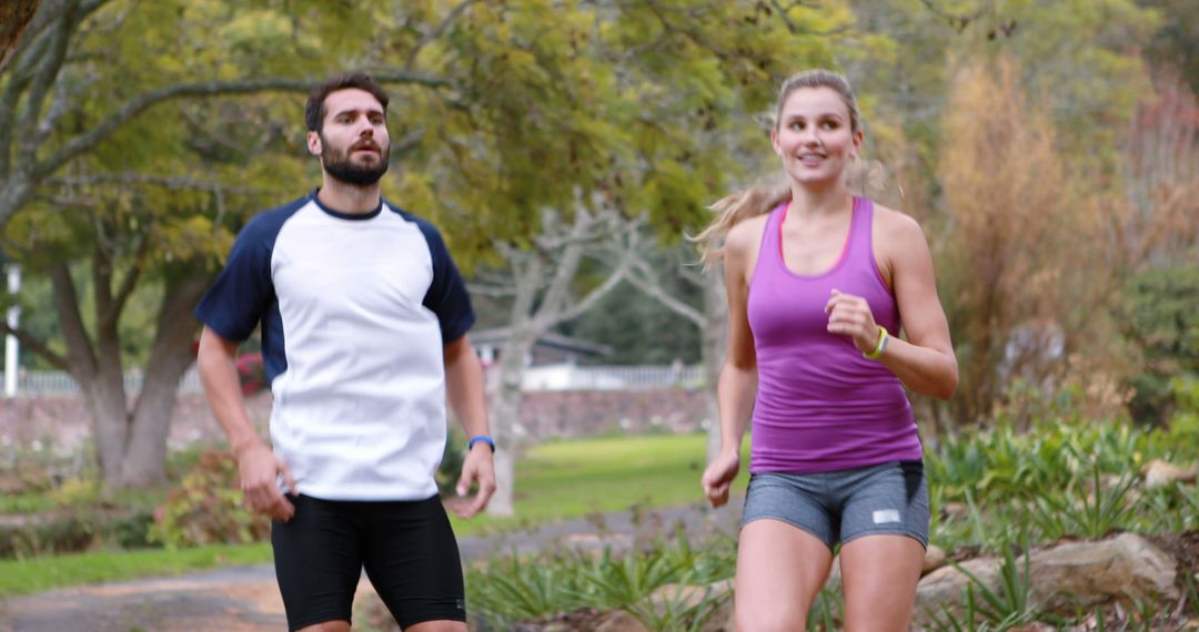 Couple Running Outdoors in Park for Fitness - Free Images, Stock Photos and Pictures on Pikwizard.com