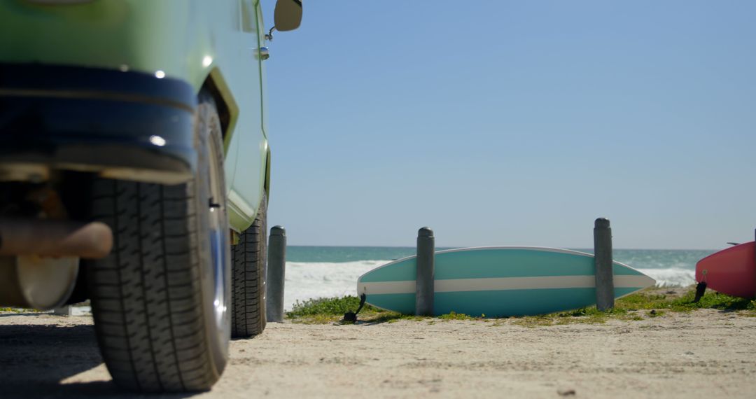 Vintage Camper Van Parked by Surfboards at Beach - Free Images, Stock Photos and Pictures on Pikwizard.com