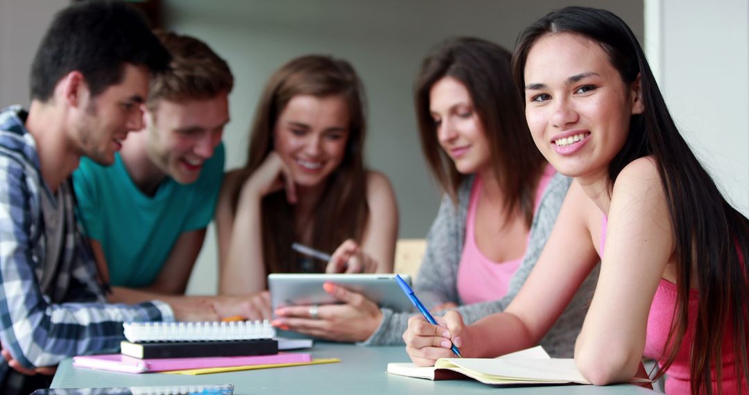 Group of college students studying and interacting together - Free Images, Stock Photos and Pictures on Pikwizard.com