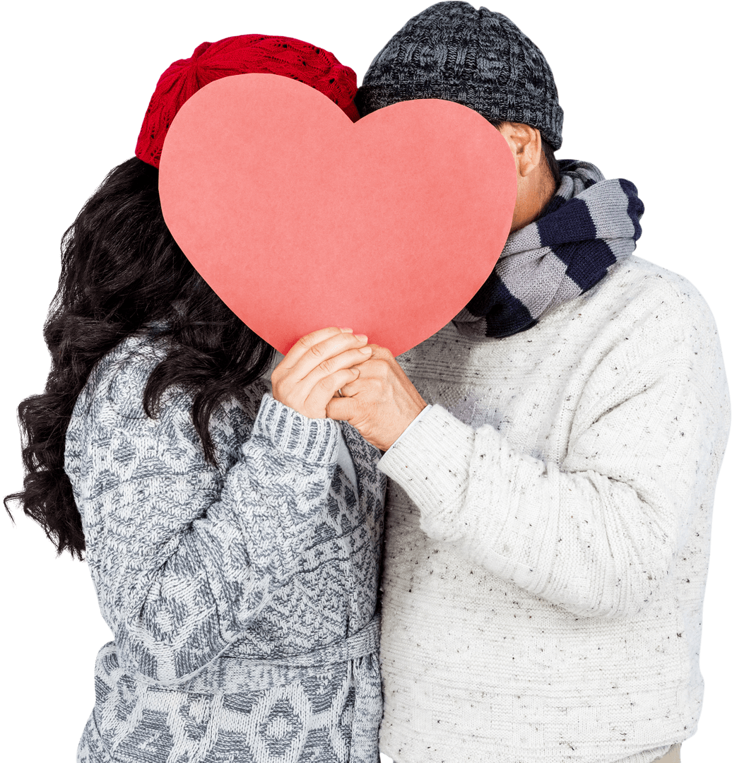Couple Hiding Smiling Behind Heart Cardboard Transparent Winter Concept