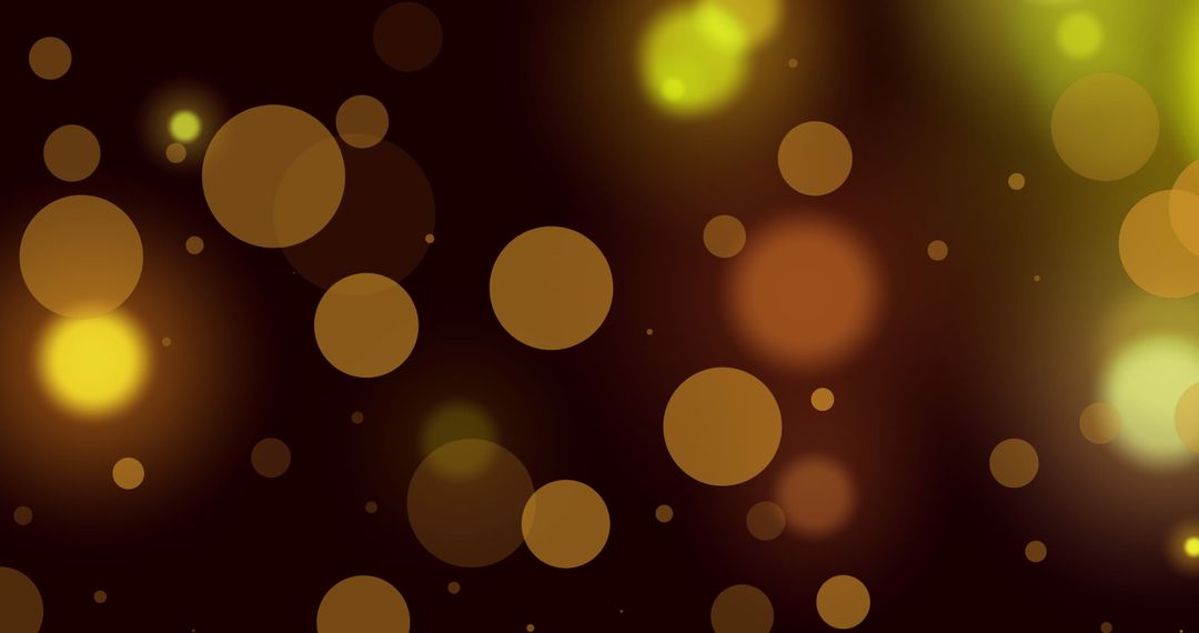 Glowing Bokeh Light Background with Yellow and Orange Spots