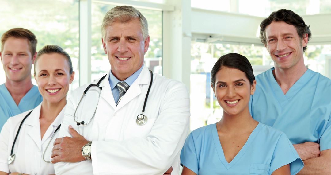 Medical Team Group Portrait with Doctors and Nurses in Hospital - Free Images, Stock Photos and Pictures on Pikwizard.com