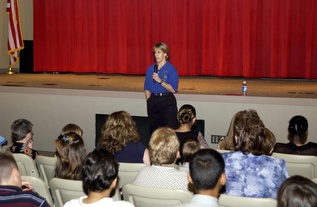 Speaker Addressing Students at Kennedy Space Center Auditorium