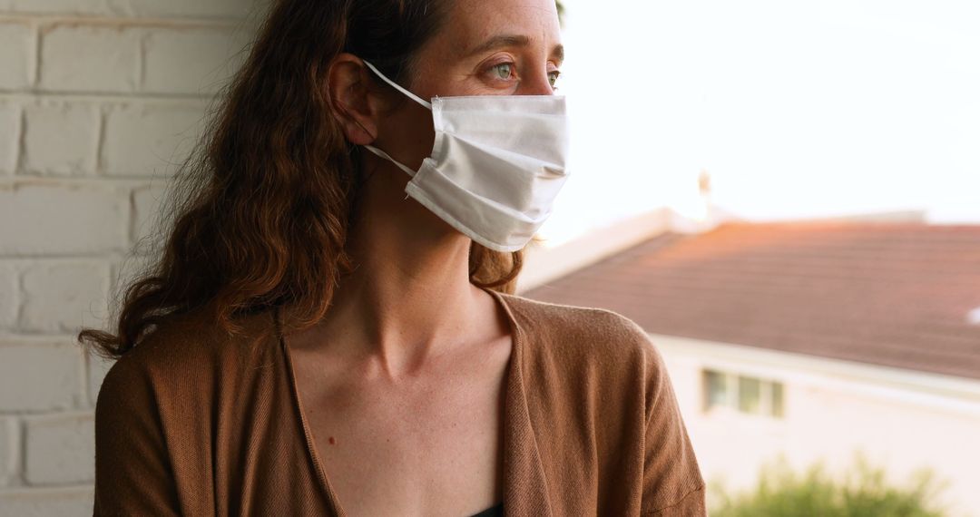 Woman Reflecting in Isolation During Pandemic - Free Images, Stock Photos and Pictures on Pikwizard.com