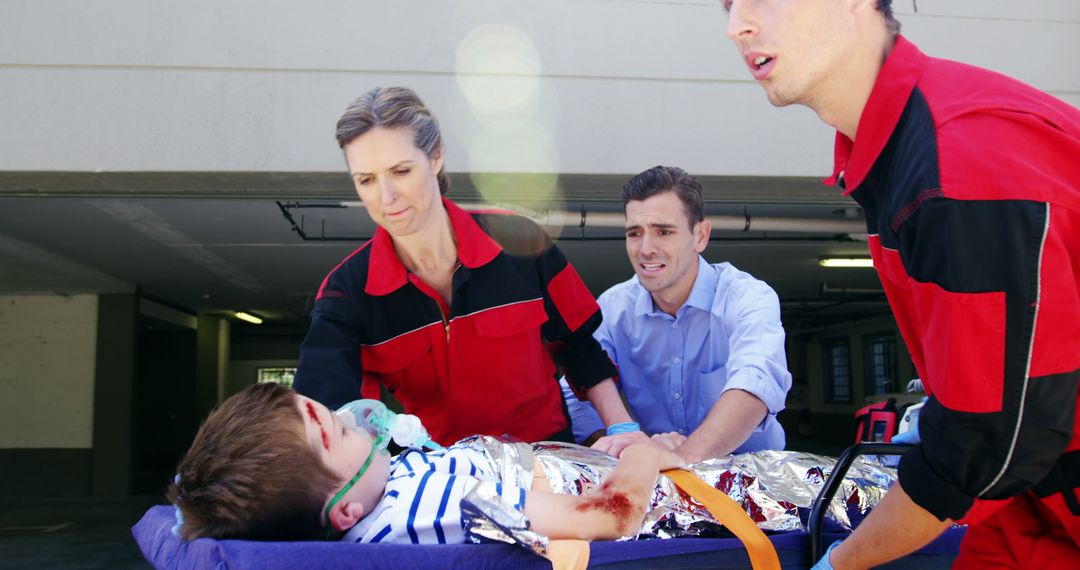 Emergency Responders Assisting Injured Child on Stretcher - Free Images, Stock Photos and Pictures on Pikwizard.com