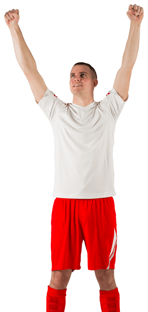 Excited Soccer Player in Red Shorts with Raised Arms on Transparent Background
