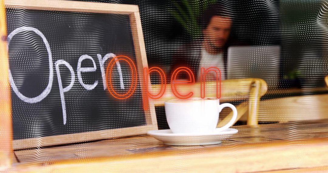 Chalkboard Open Sign with Coffee in Cozy Café Setting