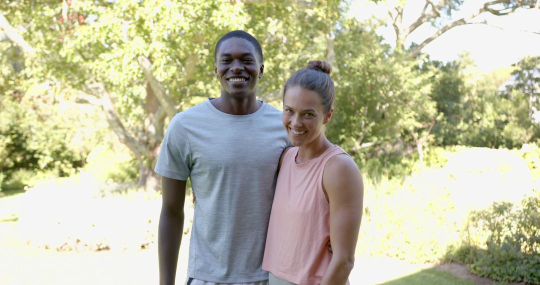 Smiling Diverse Couple Enjoying Sunny Park