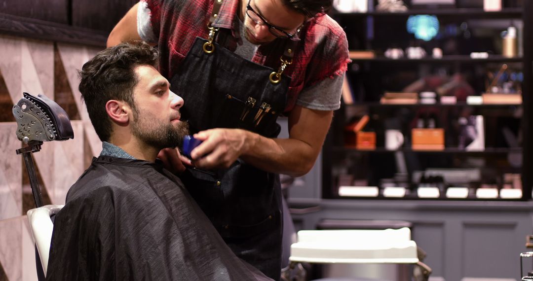 Stylist Grooming Customer's Beard with Razor in Trendy Barbershop - Free Images, Stock Photos and Pictures on Pikwizard.com