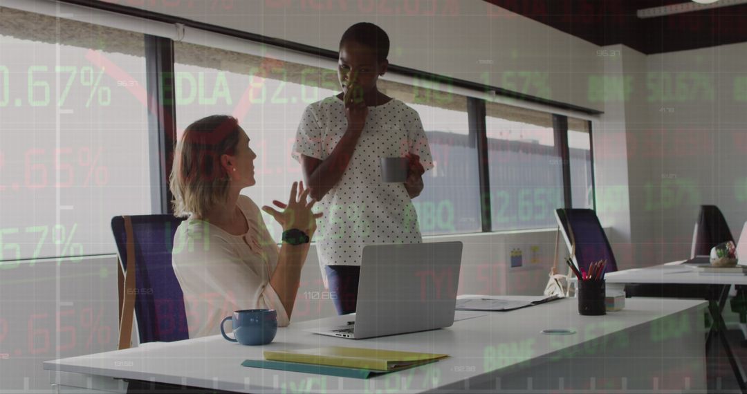 Business Colleagues Collaborating in Modern Office with Data Overlay