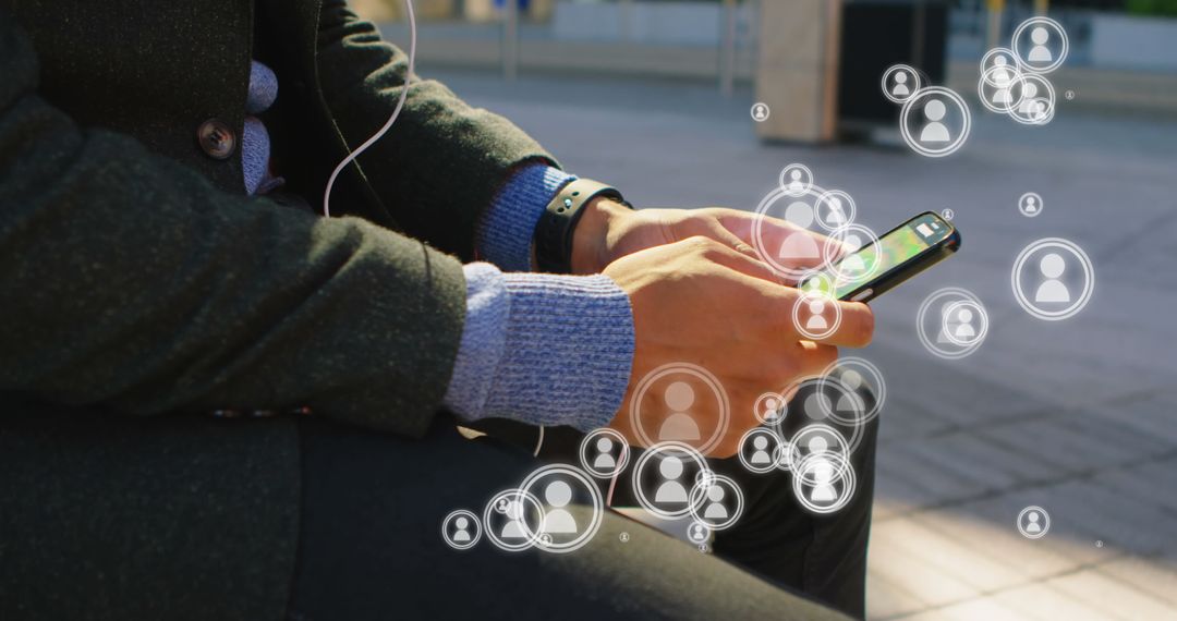 Man Engaging in Social Networking with Smartphone Outdoors