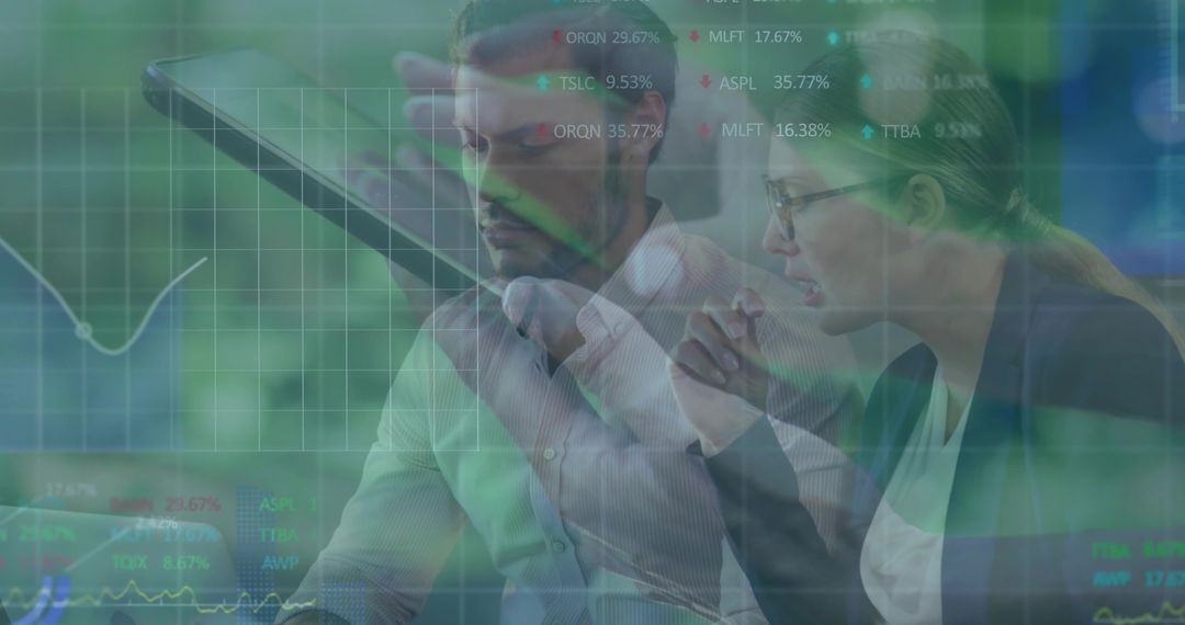 Business team analyzing financial data on tablet with stock market overlays and charts