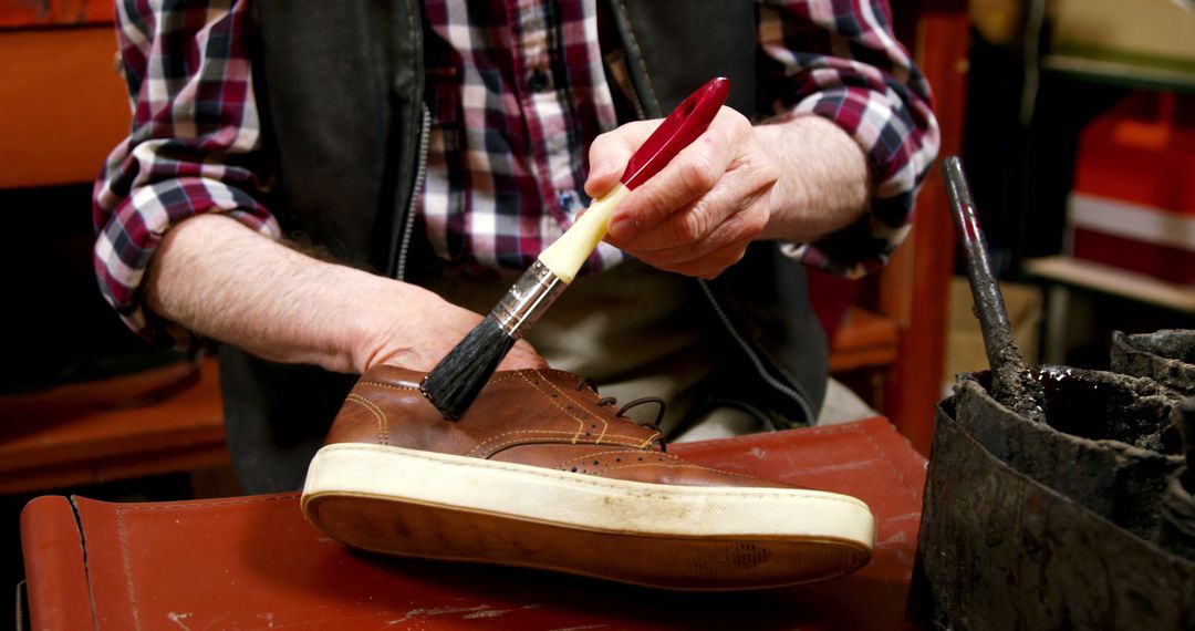 Cobbler Polishing Brown Casual Shoe in Workshop - Free Images, Stock Photos and Pictures on Pikwizard.com