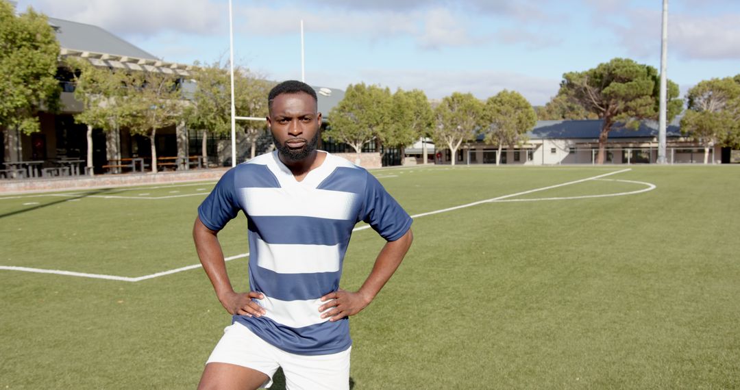 Confident Rugby Player Standing on Field