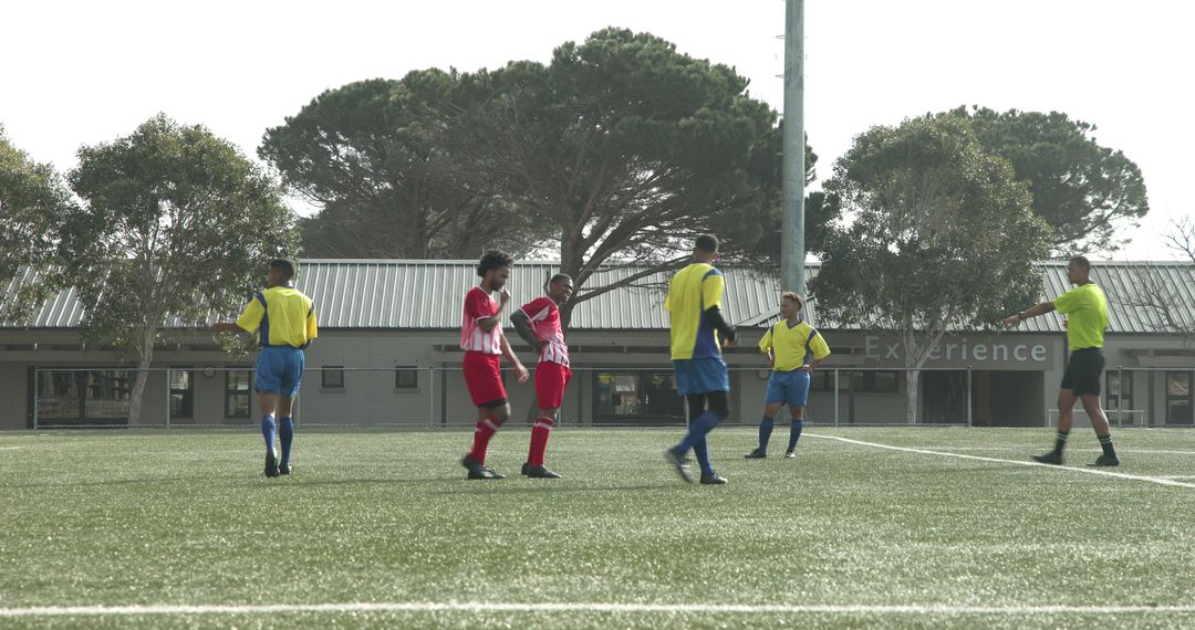 Youth Soccer Players Building Teamwork During Field Practice