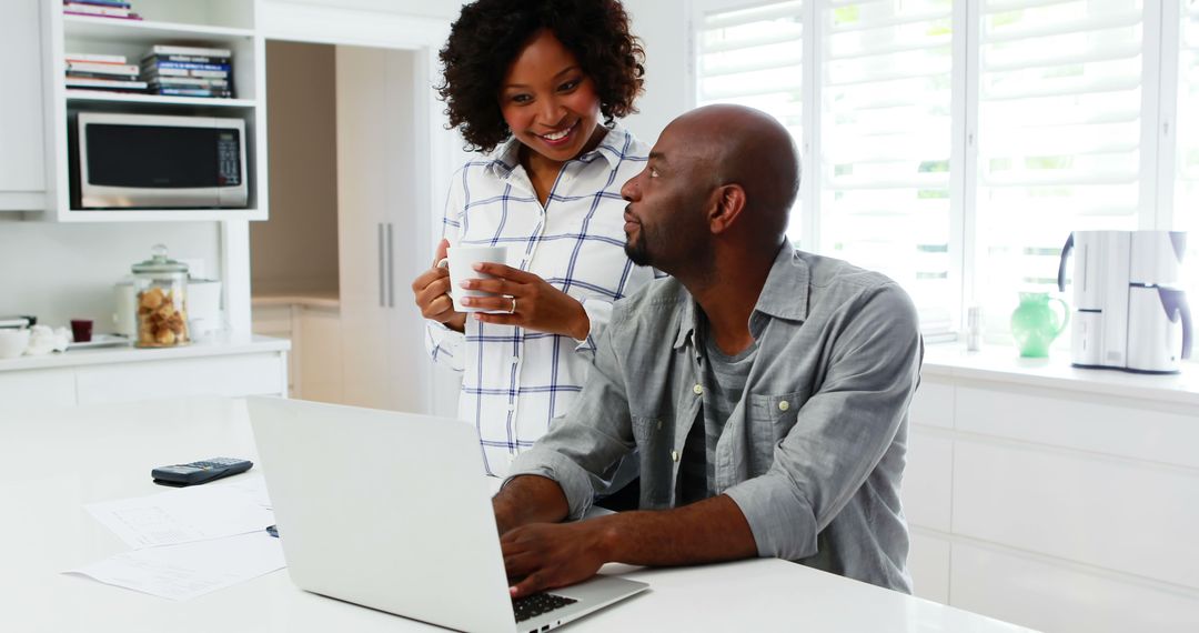 Couple Collaborating in a Bright Kitchen Atmosphere