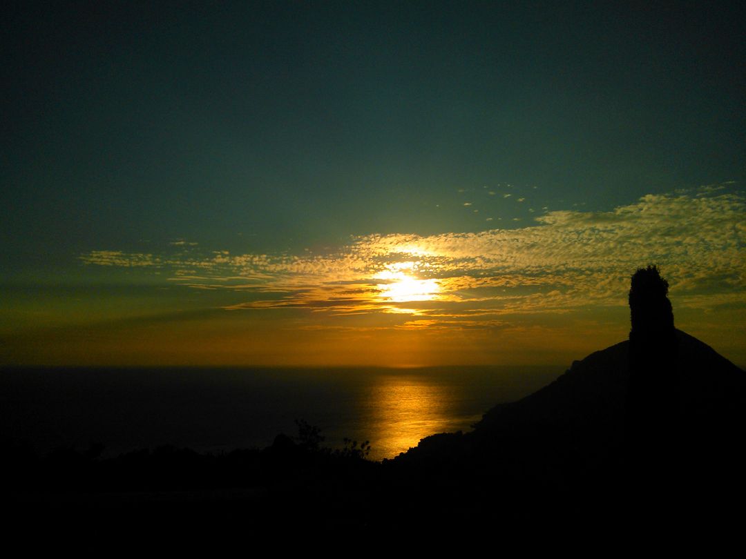 Silhouette of Mountain Beside Body of Water during Sunset - Free Images, Stock Photos and Pictures on Pikwizard.com