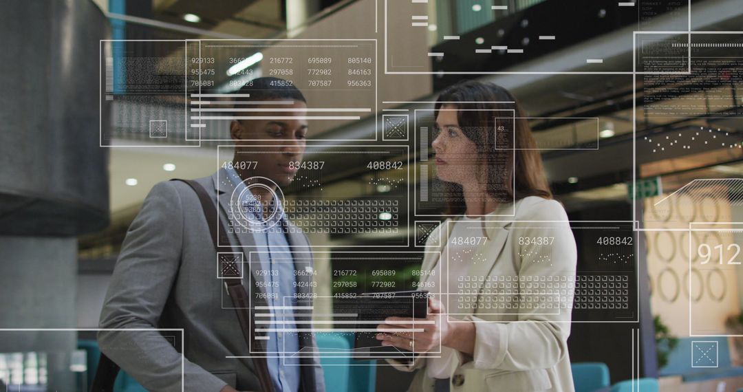 Business Professionals Analyzing Digital Data Visuals