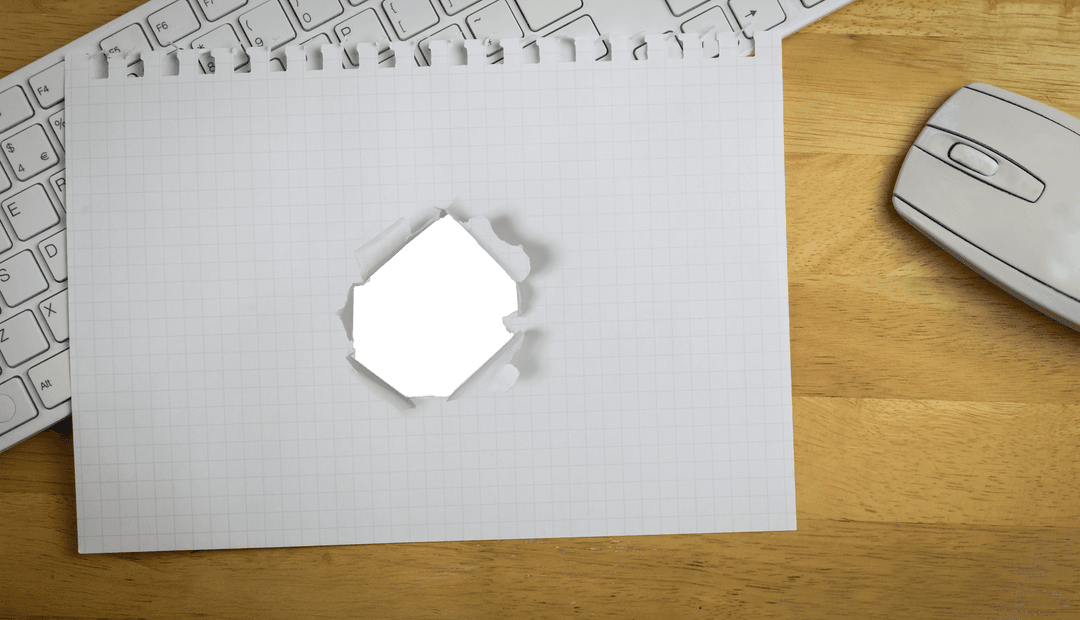 Holed Paper Over Keyboard with Transparent Center Design