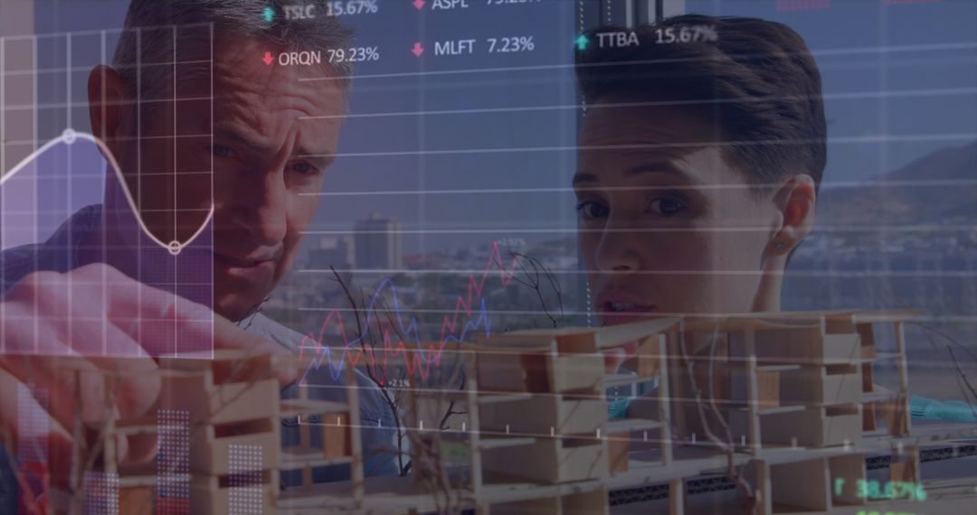 Architects Analyzing Building Models with Stock Market Data Overlay