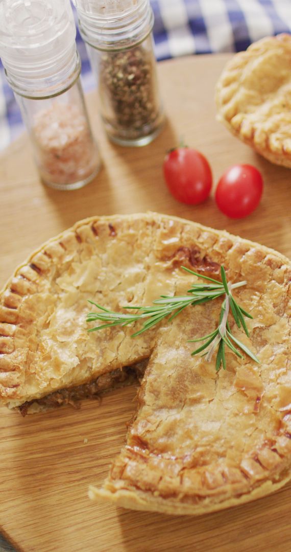 Savoury Pie with Rosemary on Rustic Table