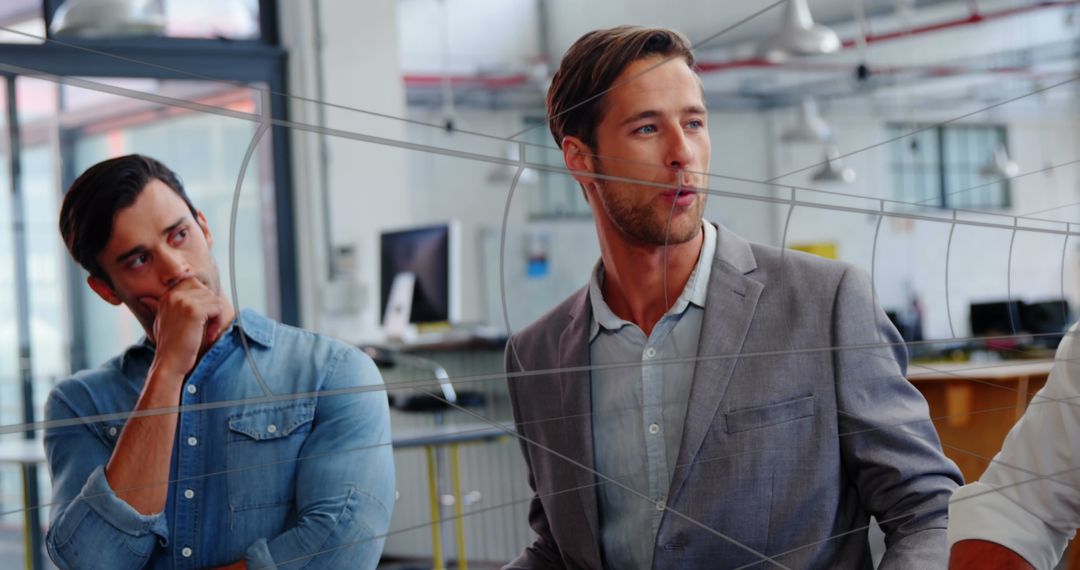 Dynamic business meeting in modern office with diverse team collaborating