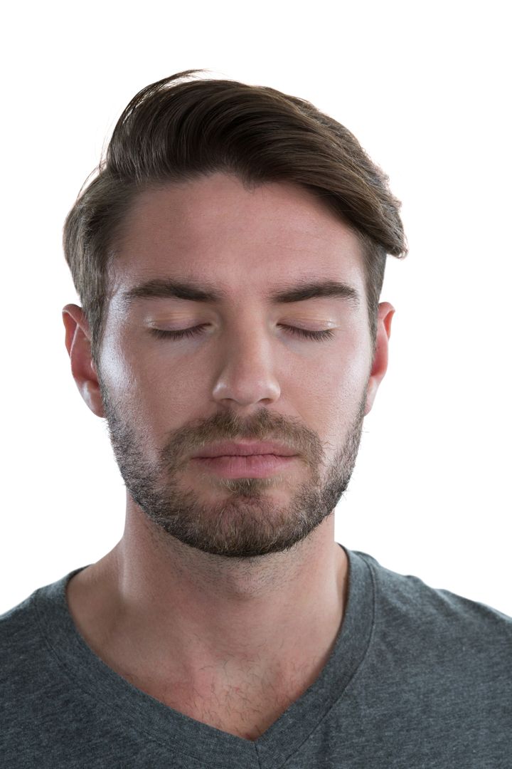 Man Meditating with Eyes Closed Against White Background - Free Images, Stock Photos and Pictures on Pikwizard.com