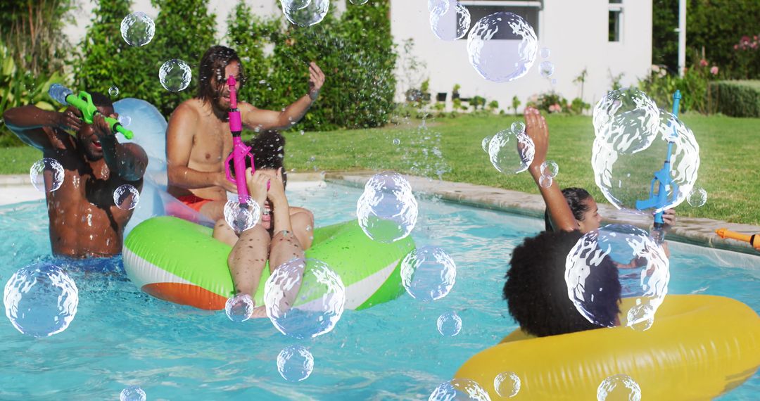 Diverse Friends Enjoying Splashing and Relaxing in Pool with Inflatables