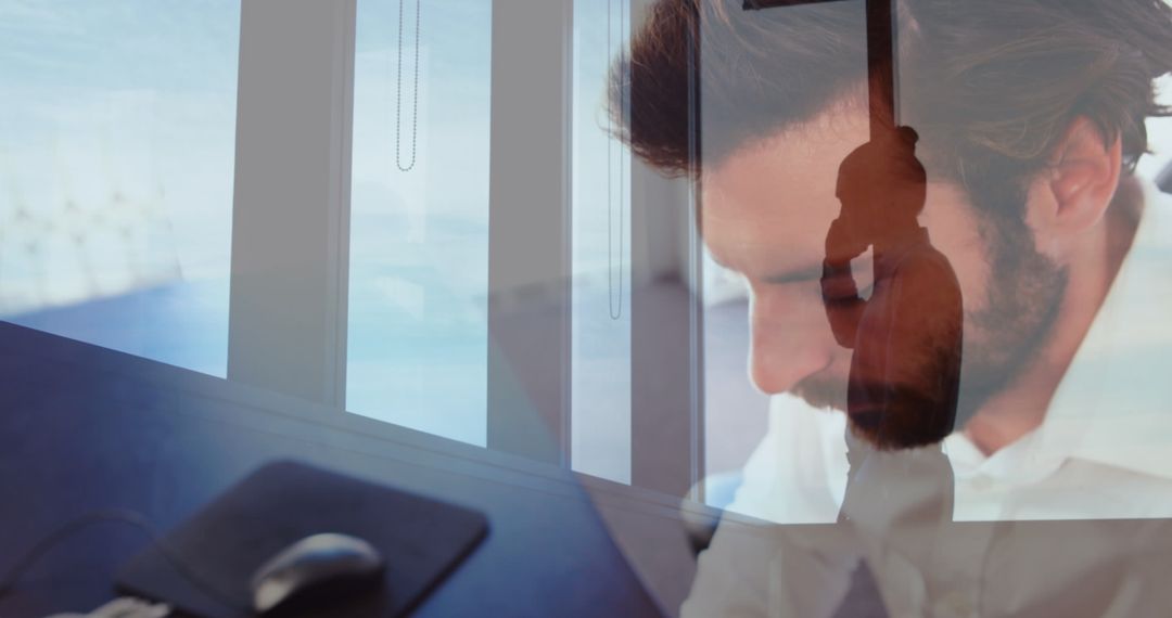 Professional Man Focusing on Laptop Work at Office Desk