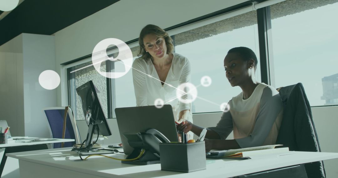 Diverse Team Analyzing Digital Reports in Modern Office