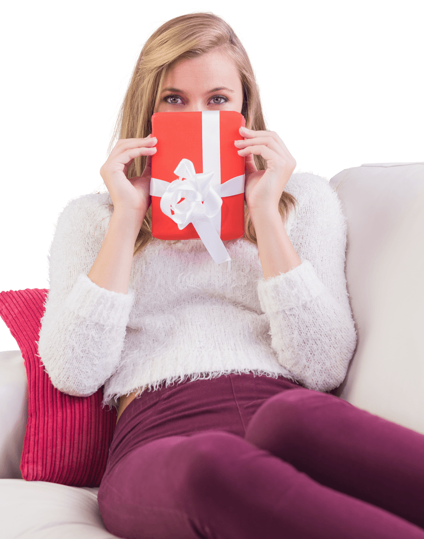 Woman Relaxing on Sofa with Gift, Peeking Over Romantic Package