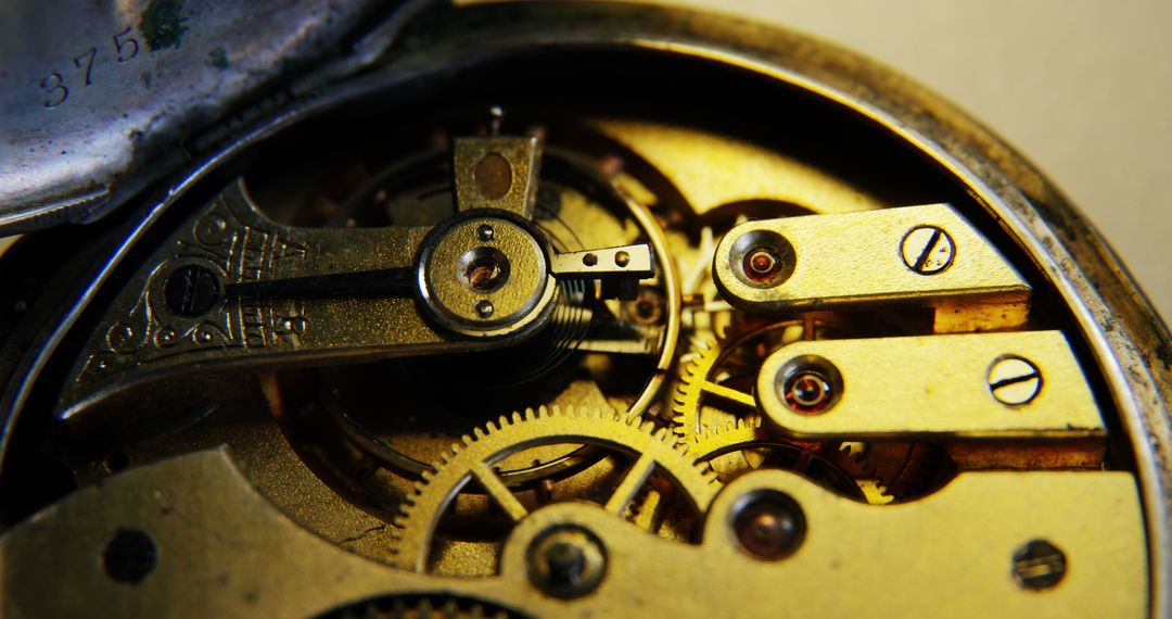 Close-up of Antique Pocket Watch Mechanism Showing Detailed Gears and Components - Free Images, Stock Photos and Pictures on Pikwizard.com