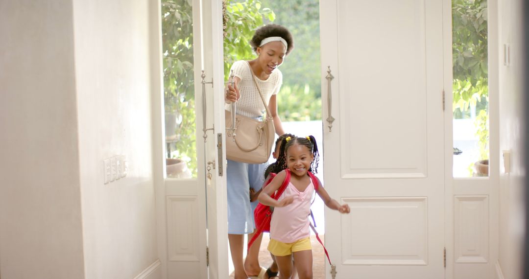 Mother and Daughter Returning Home with Smiles - Free Images, Stock Photos and Pictures on Pikwizard.com