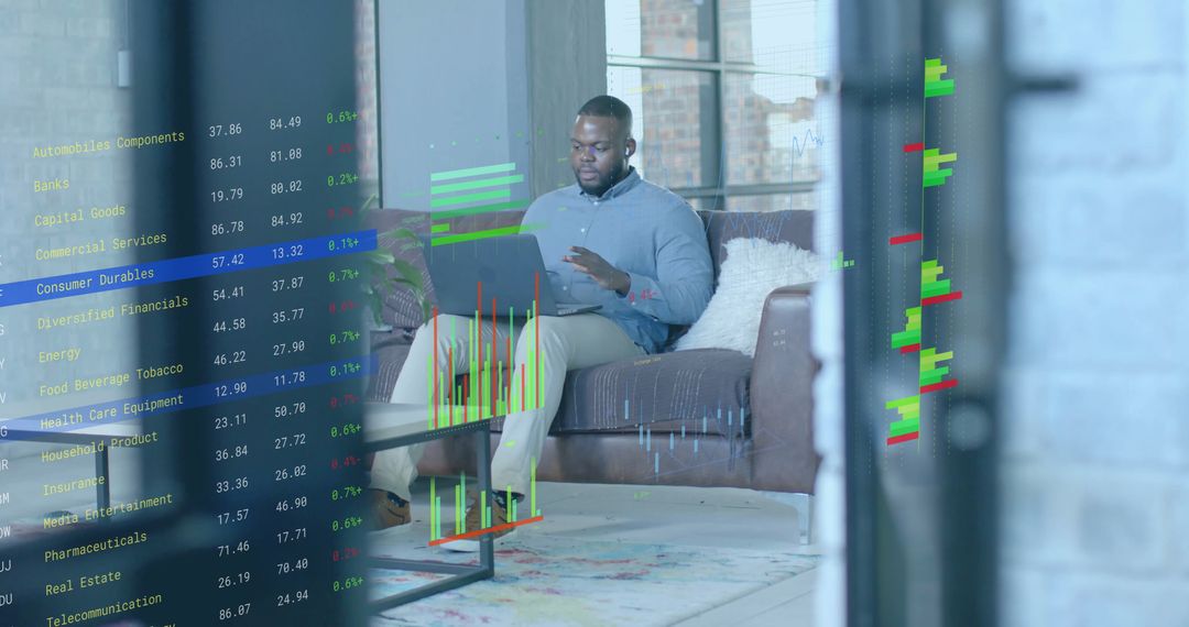 Businessman Analyzing Financial Data on Laptop in Office