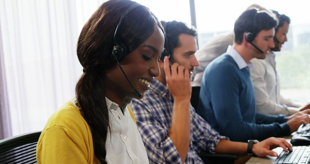 Diverse Customer Service Team Smiling and Assisting Clients - Free Images, Stock Photos and Pictures on Pikwizard.com