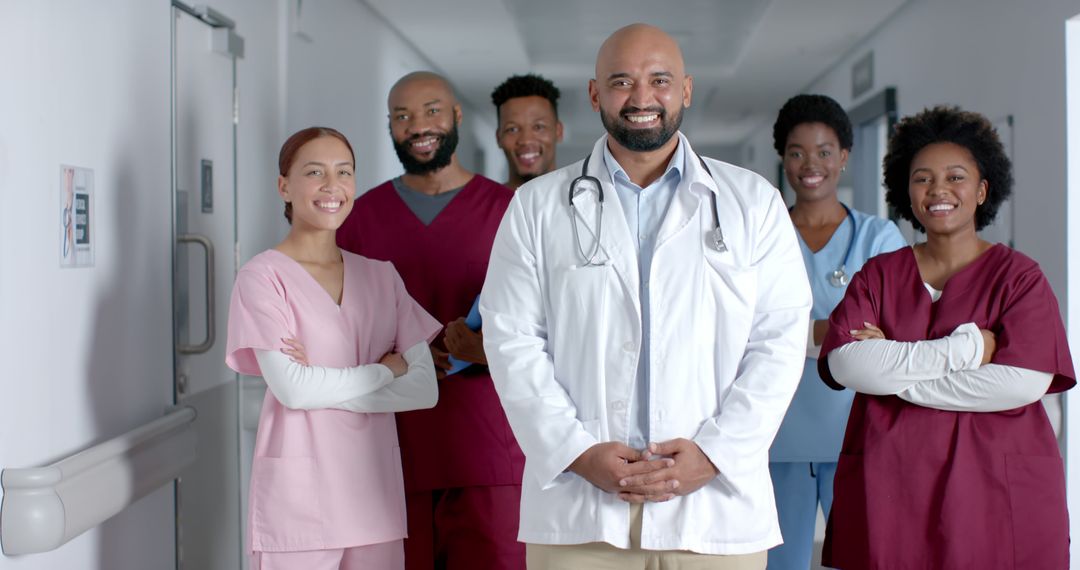 Happy Smile: Diverse Healthcare Team Standing Together in Hospital Corridor - Free Images, Stock Photos and Pictures on Pikwizard.com