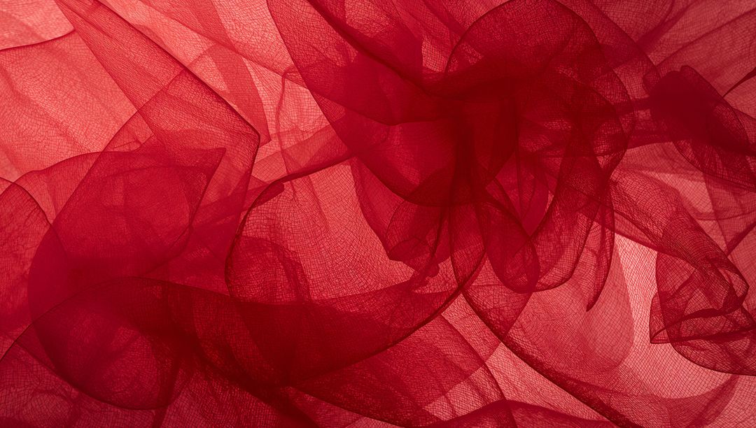 Crimson Tulle Layers Draping Over Backlit Surface Abstract Textile Background