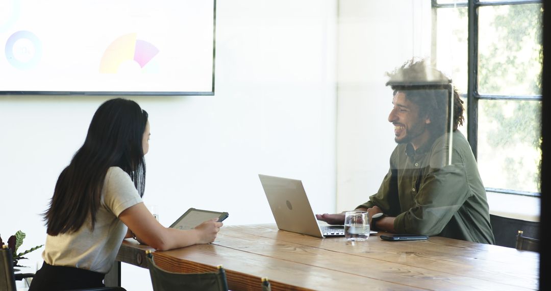 Diverse Colleagues Collaborative Meeting in Modern Office