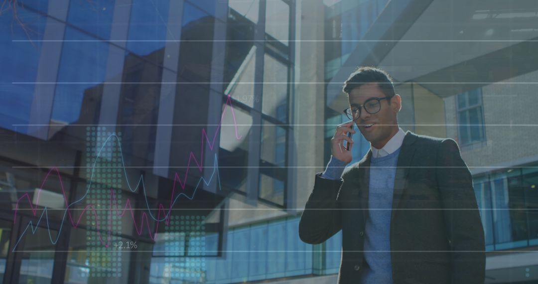 Businessman Analyzing Financial Growth on Phone Call