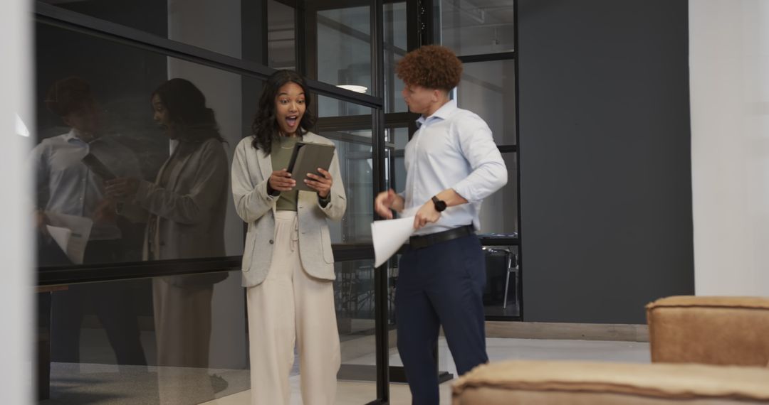 Colleagues Engaging in Collaborative Discussion with Digital Tablet