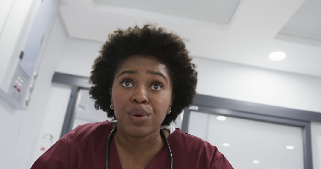 African American Female Nurse in Hospital Interviewing Patient - Free Images, Stock Photos and Pictures on Pikwizard.com