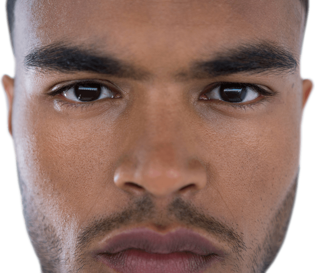 Close-Up of Confident Businessman's Face in Light