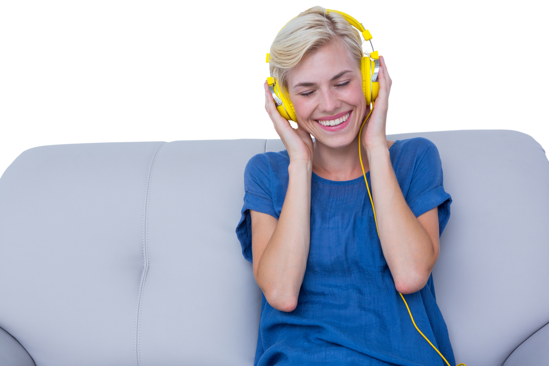 Cheerful Woman with Yellow Headphones Relaxing on Sofa - Transparent Background - Download Free Stock Images Pikwizard.com